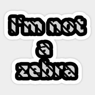 I'm not a zebra. White letters with a mask in the shape of diagonal stripes Sticker